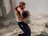 Последствия взрыва в Дамаске 28 июня 2014 года. 